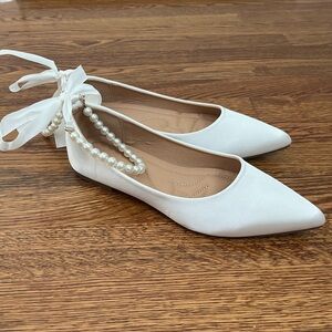 White satin flats with pearl ankle